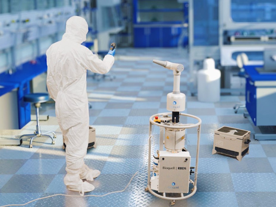 Technician in a cleanroom running a Bioquell rapid bio-decontamination